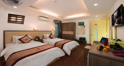 Chambre Lits Jumeaux Deluxe — Van Mieu Hotel